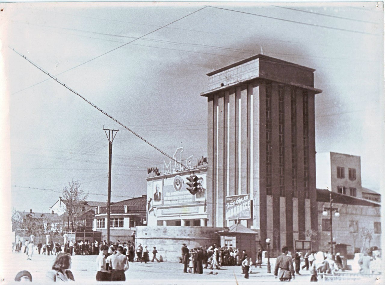 Crowded square with tower building