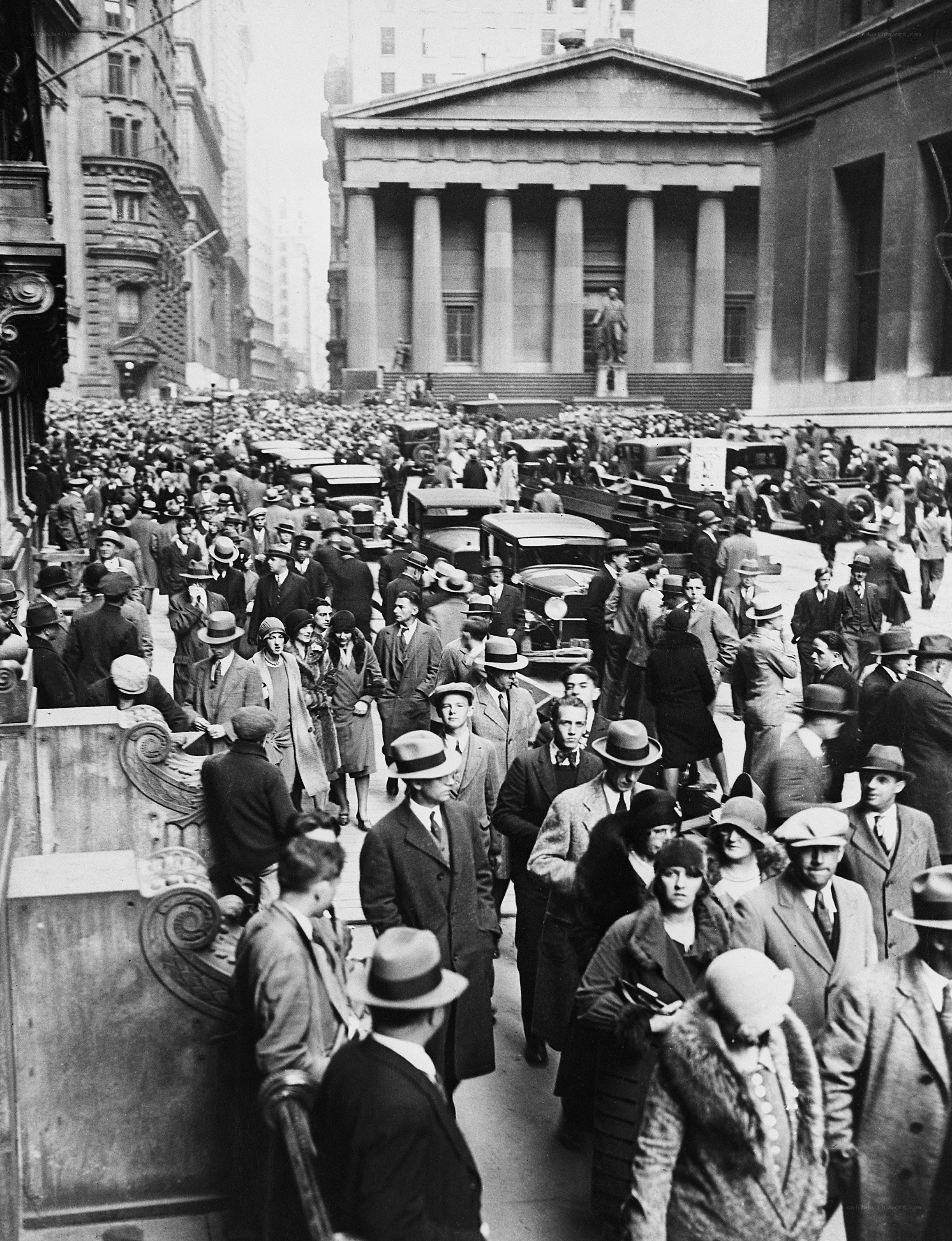 Crowded street near a classical building