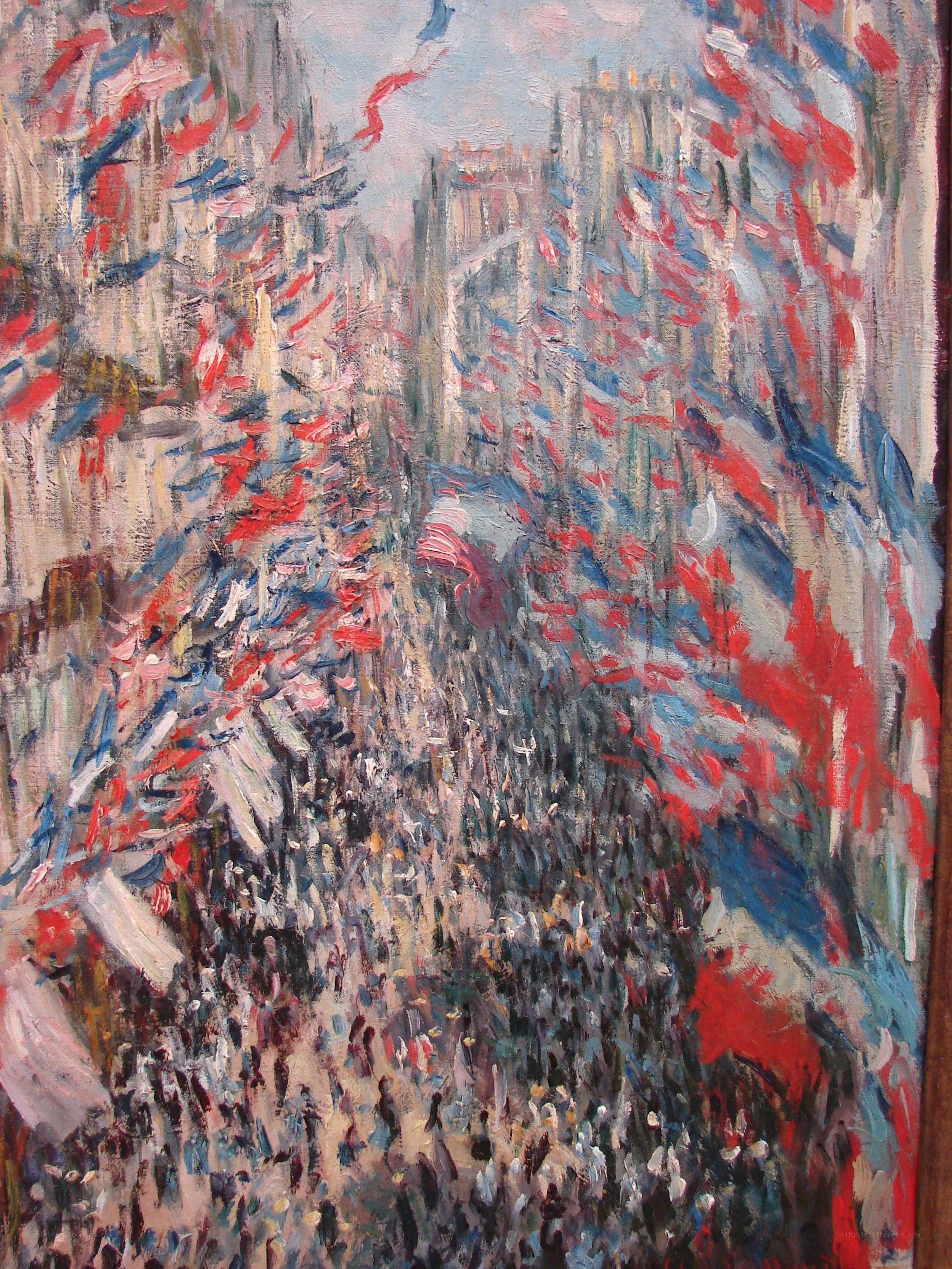 Crowded street with flags