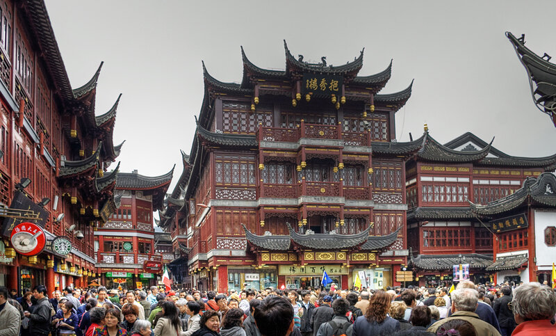 crowded street with traditional buildings