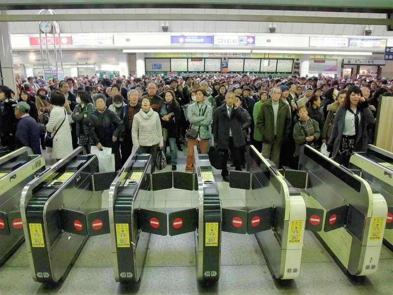Crowded train station entrance