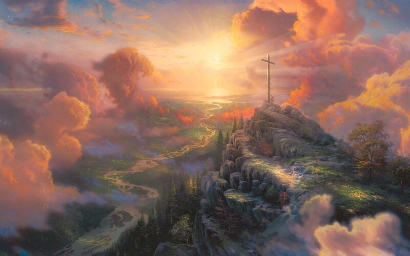 Crucifix on Mountain Peak