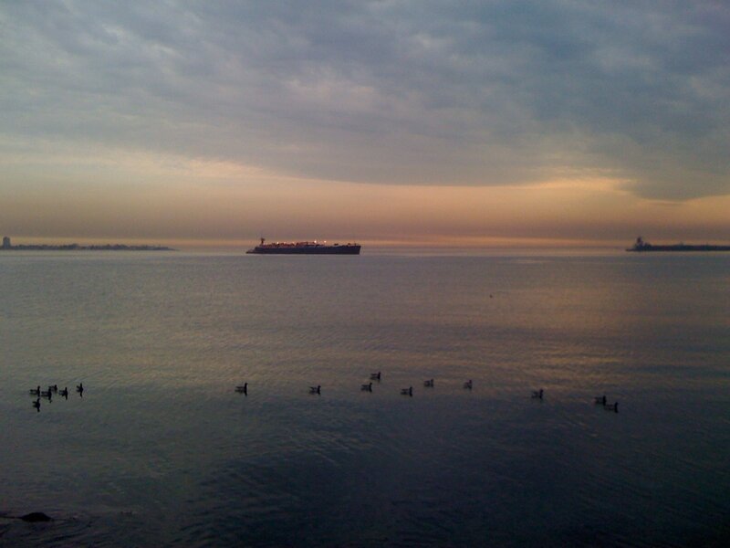 Cruise ship at dusk on calm water
