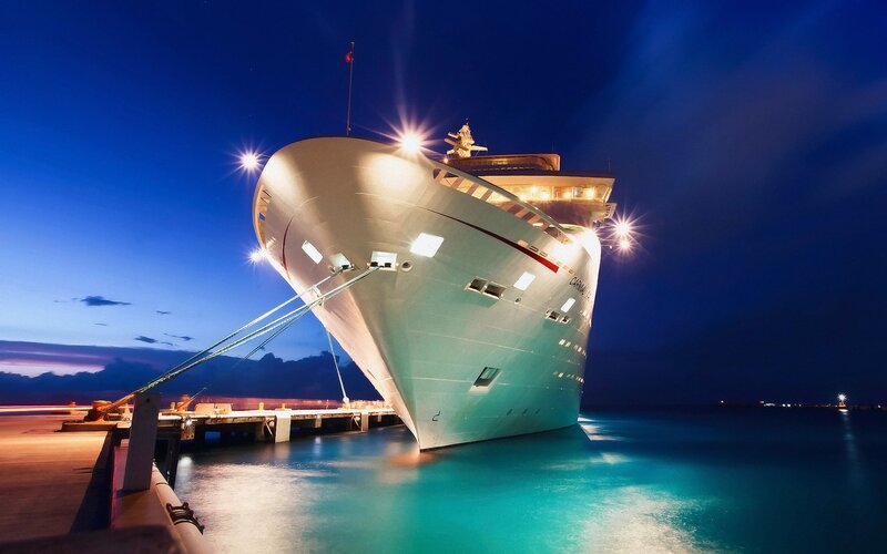 cruise ship at night docked