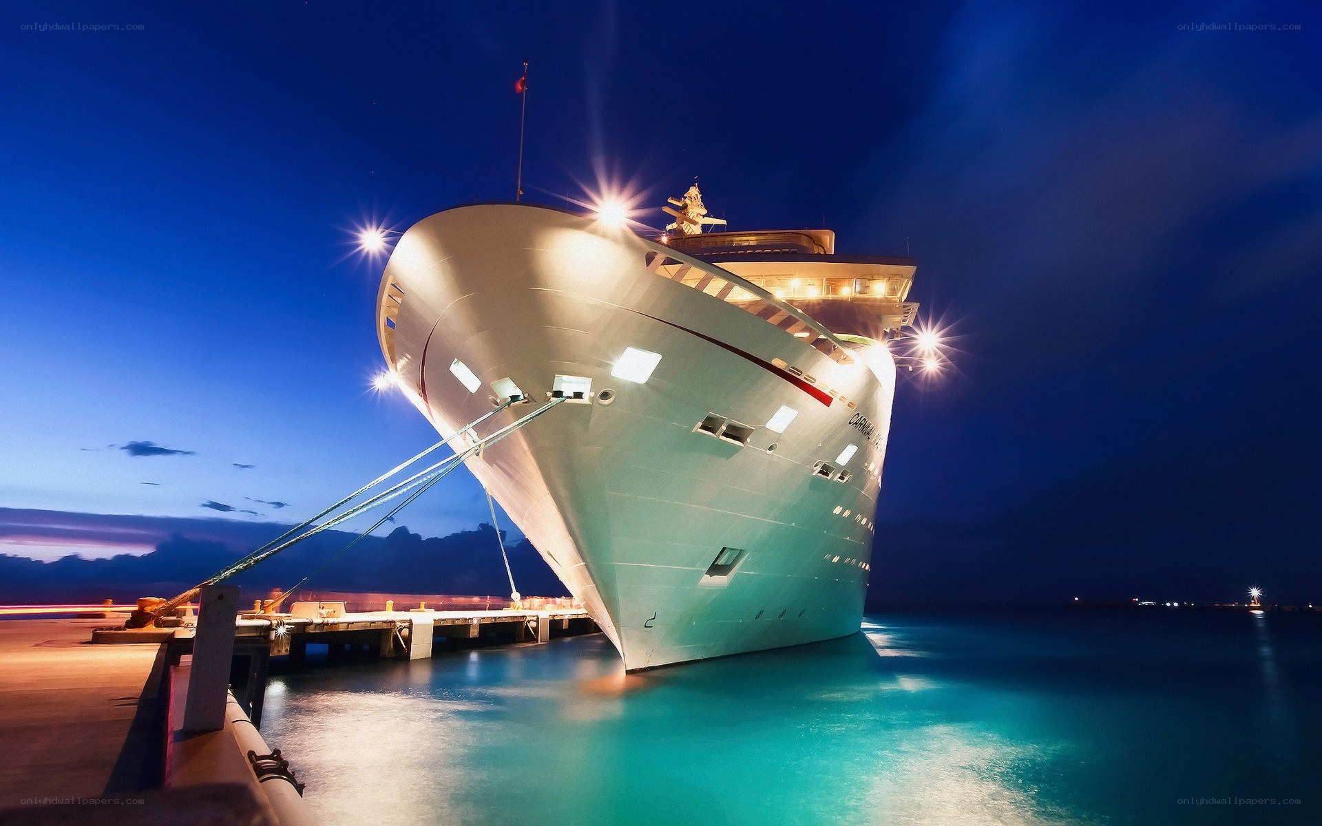 cruise ship at night docked