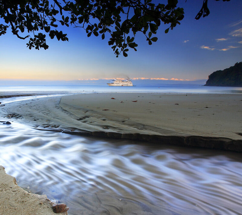 Cruise Ship at Sea — Blue, Serene, Sunset