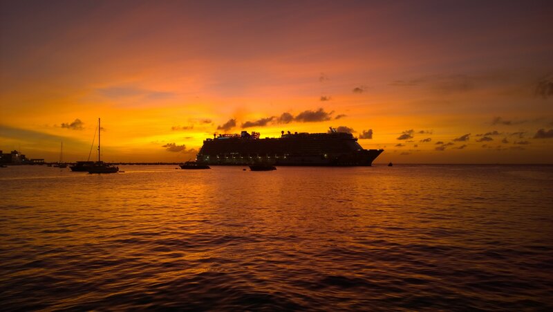 Cruise Ship at Sunset — Orange, Serene