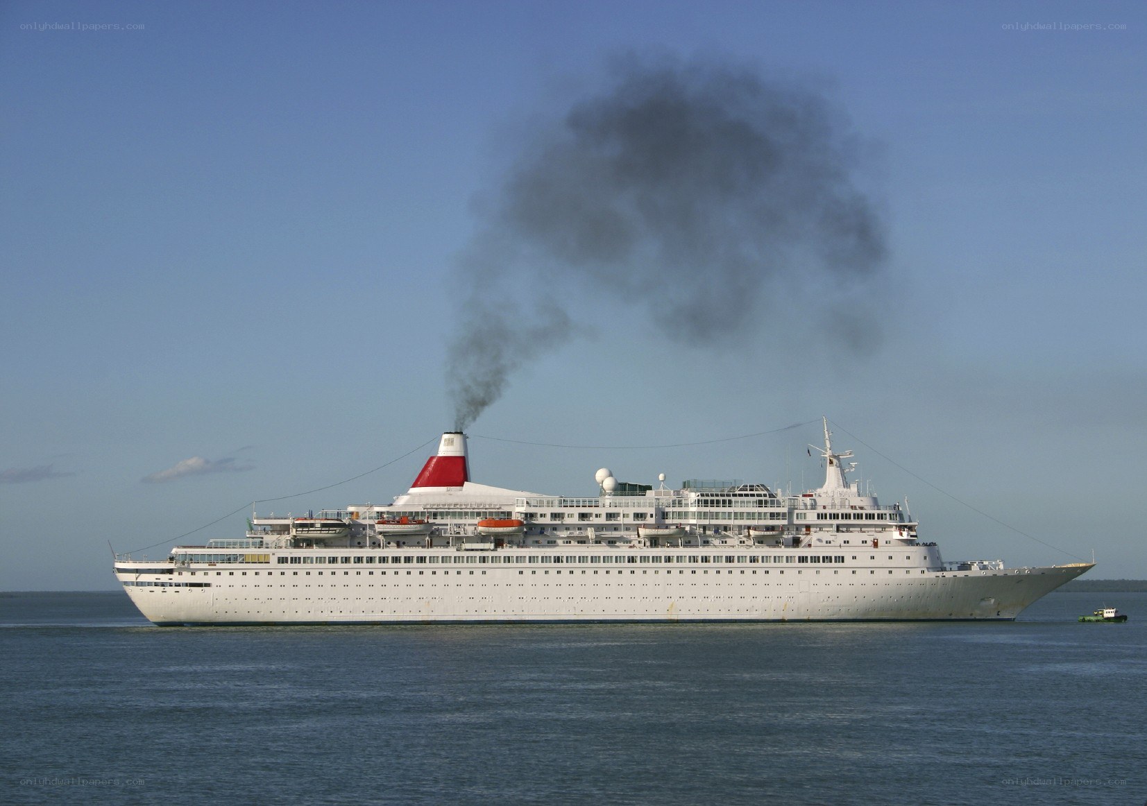 Cruise ship emitting smoke
