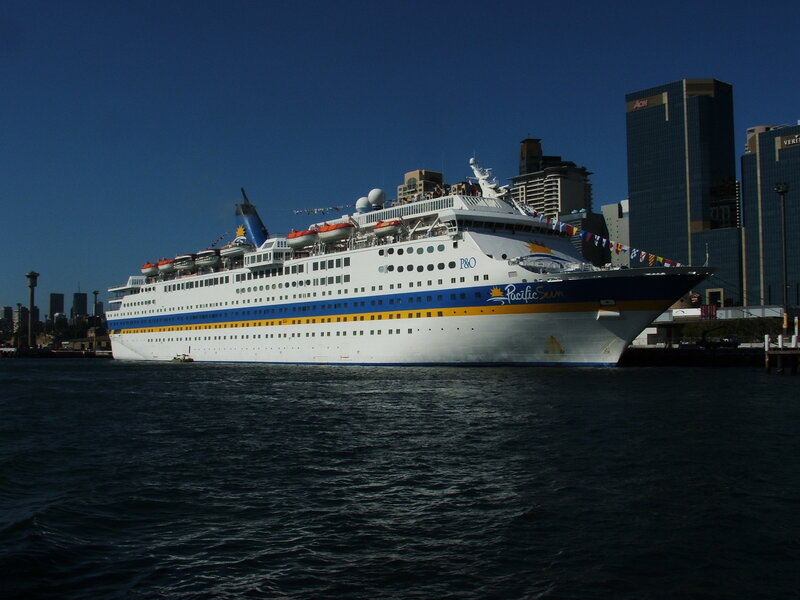 Cruise Ship in Harbor — Blue, Calm, Afternoon, Photograph, Skyscrapers