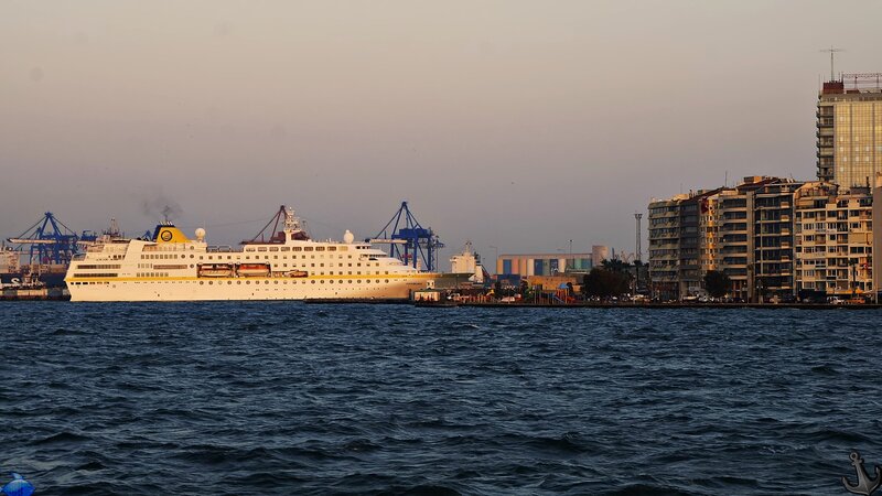Cruise Ship in Harbor — Blue, Calm, Sunset