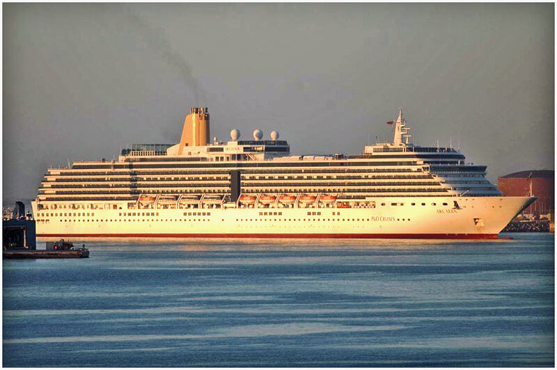 Cruise Ship in Harbor — White, Calm, Sunset