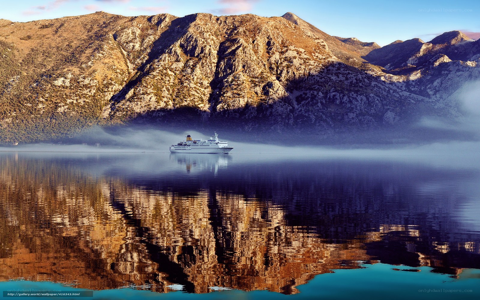 Cruise ship in mountain bay