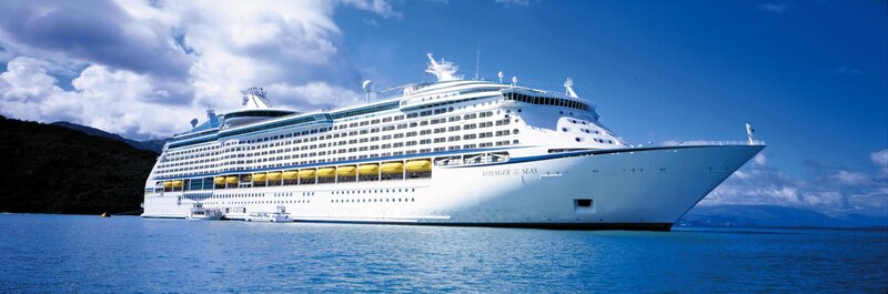 Cruise ship in tropical harbor