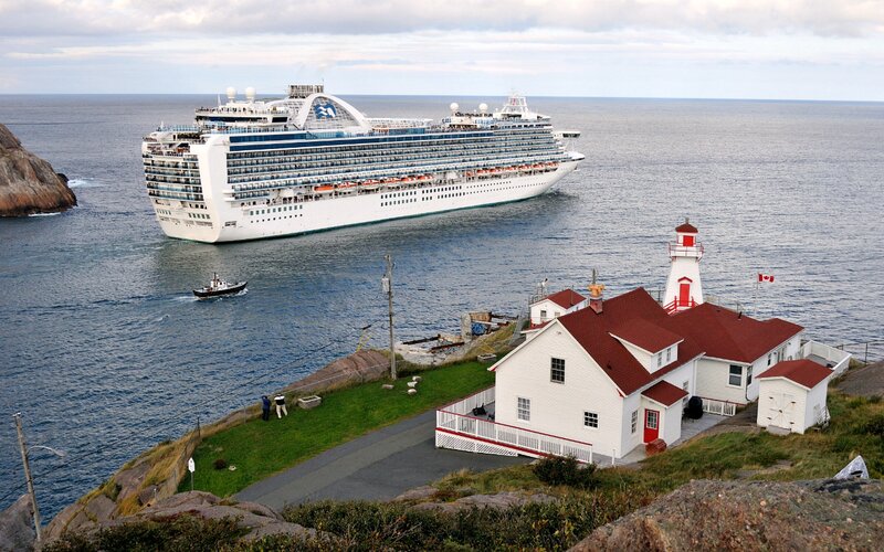 Cruise Ship Near Lighthouse