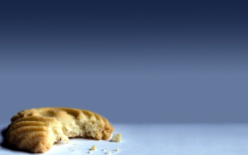 crumbled cookie on blue