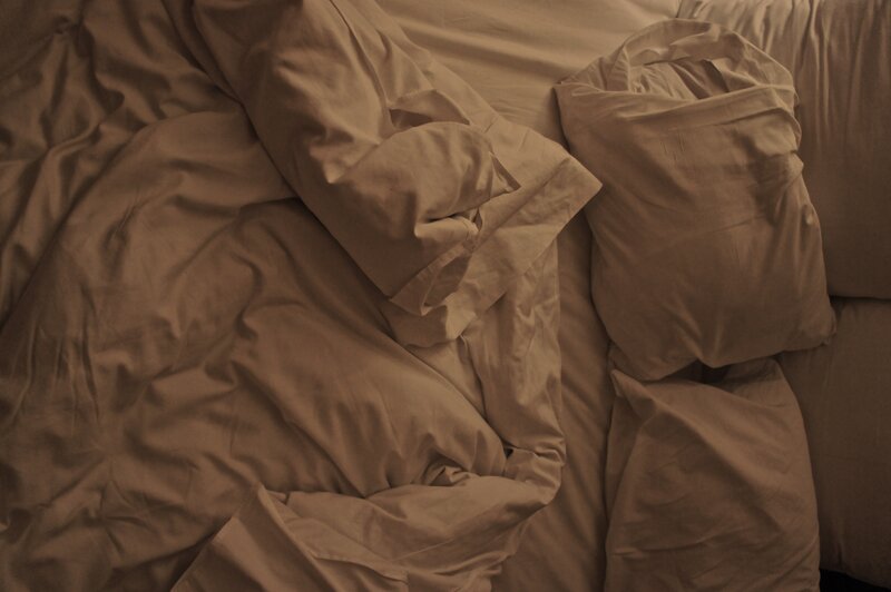 crumpled bed sheets