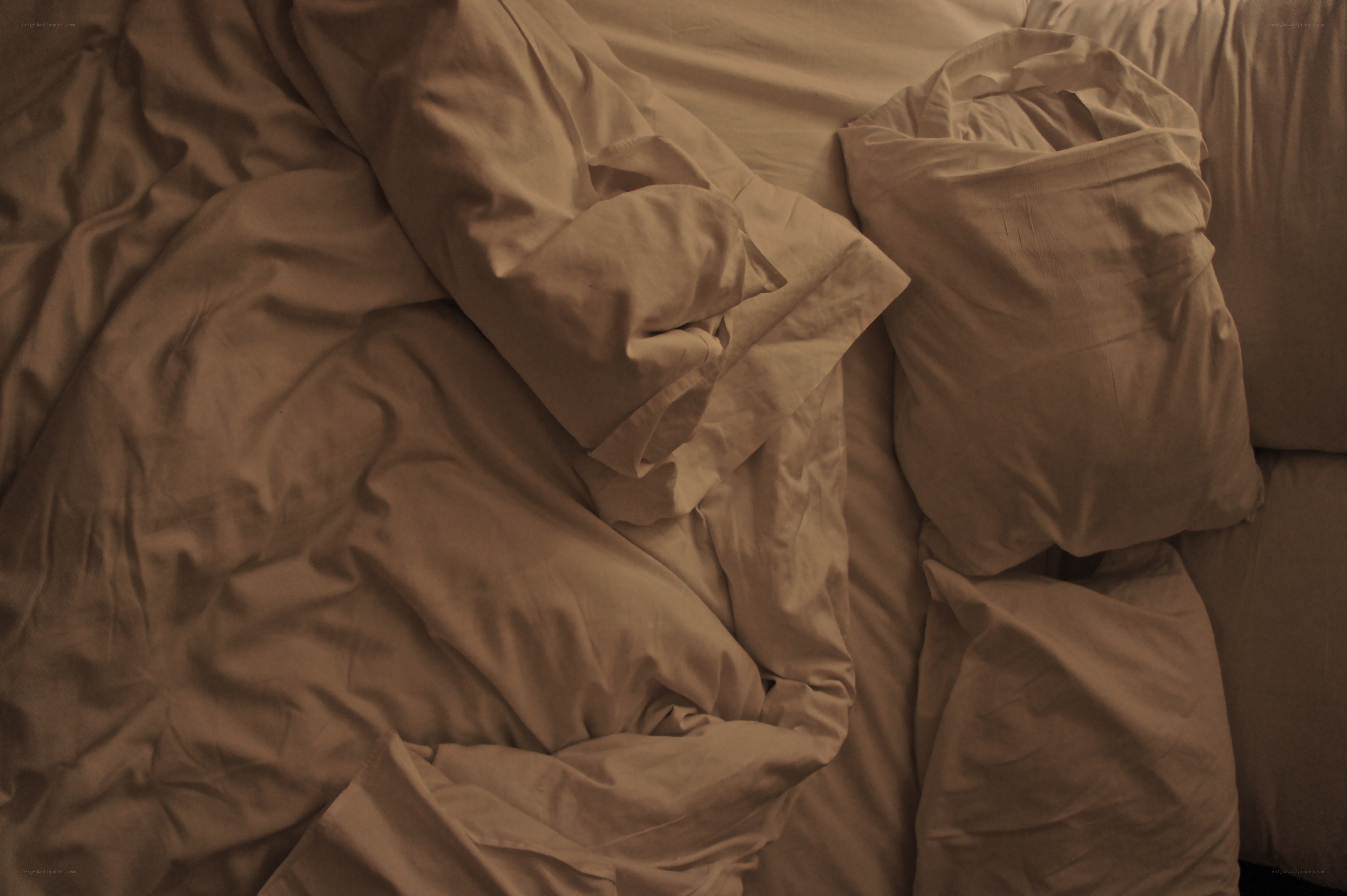 crumpled bed sheets