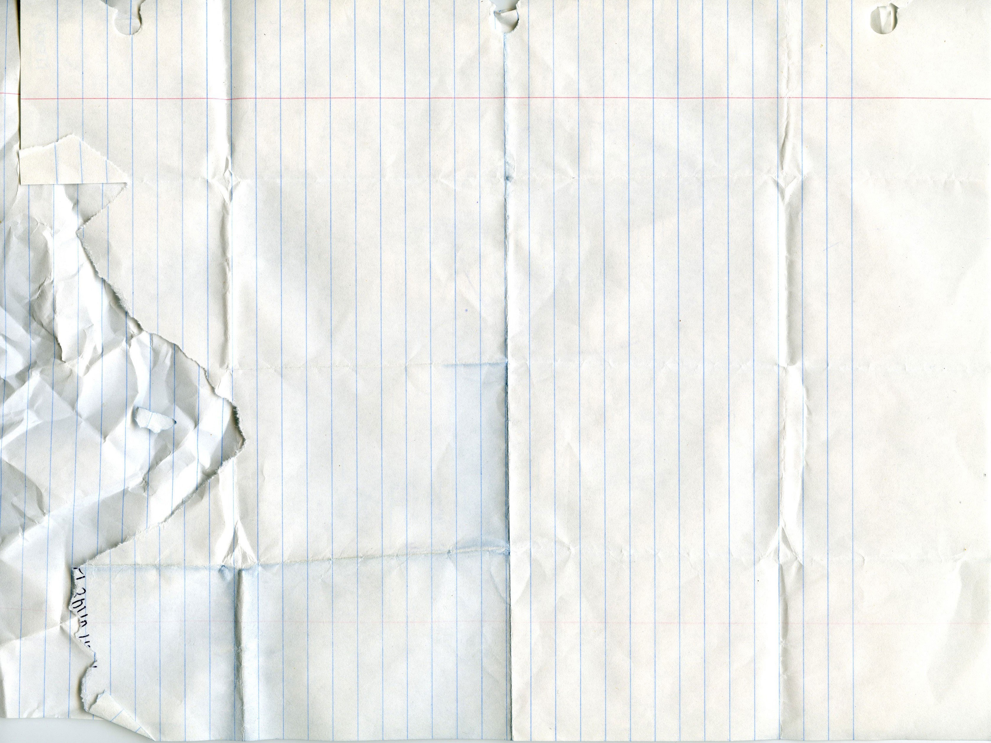 crumpled lined paper