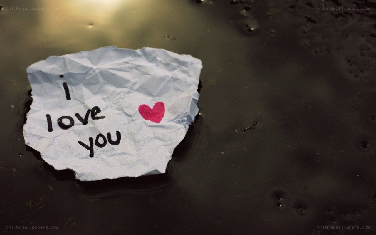 crumpled love note in water