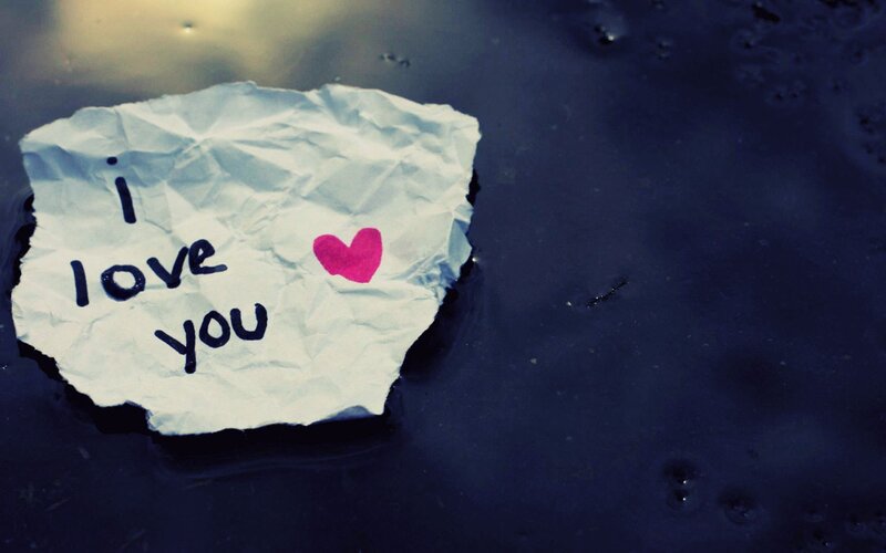 crumpled note with i love you