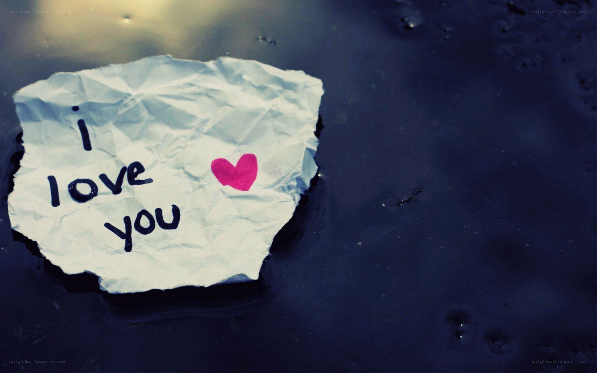 crumpled note with i love you