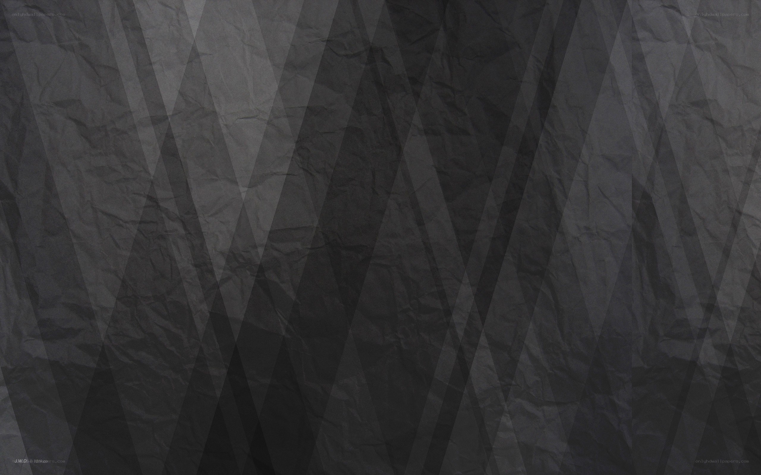 crumpled paper texture with geometric overlay