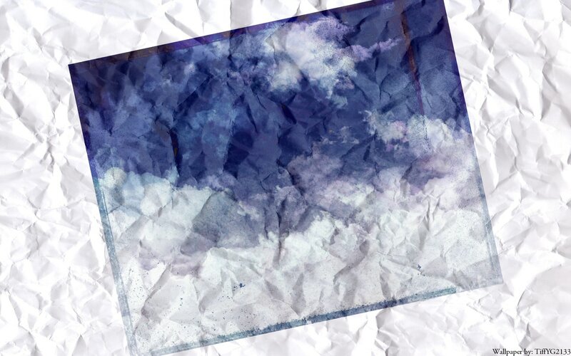 crumpled paper with blue sky