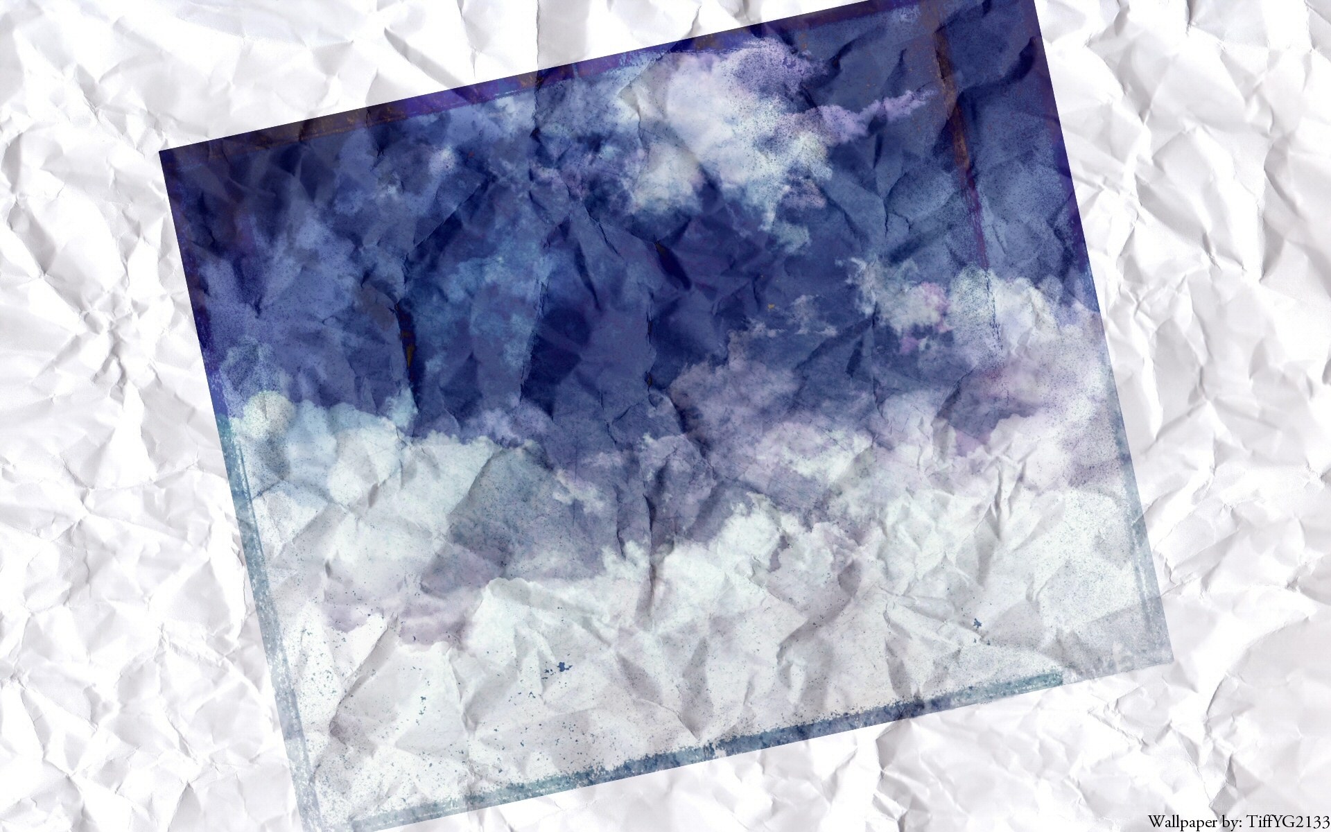 crumpled paper with blue sky