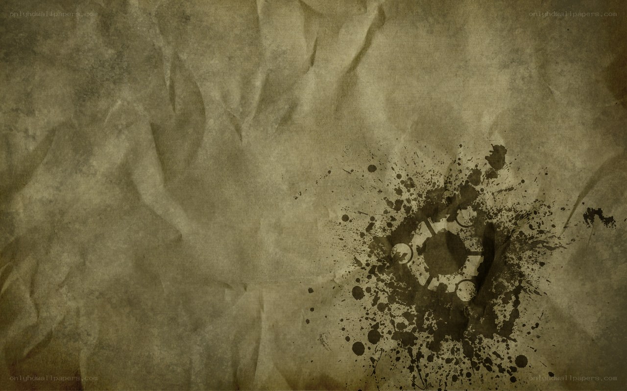 crumpled paper with ink splatter