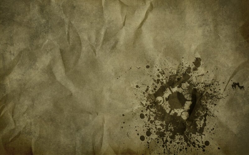 crumpled paper with ink splatter