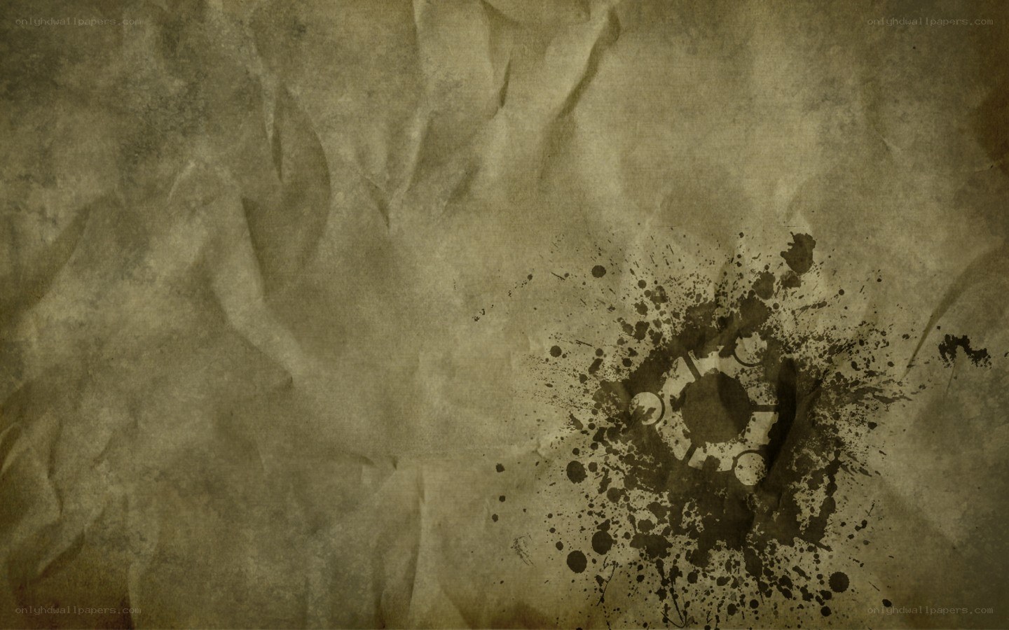 crumpled paper with ink splatter