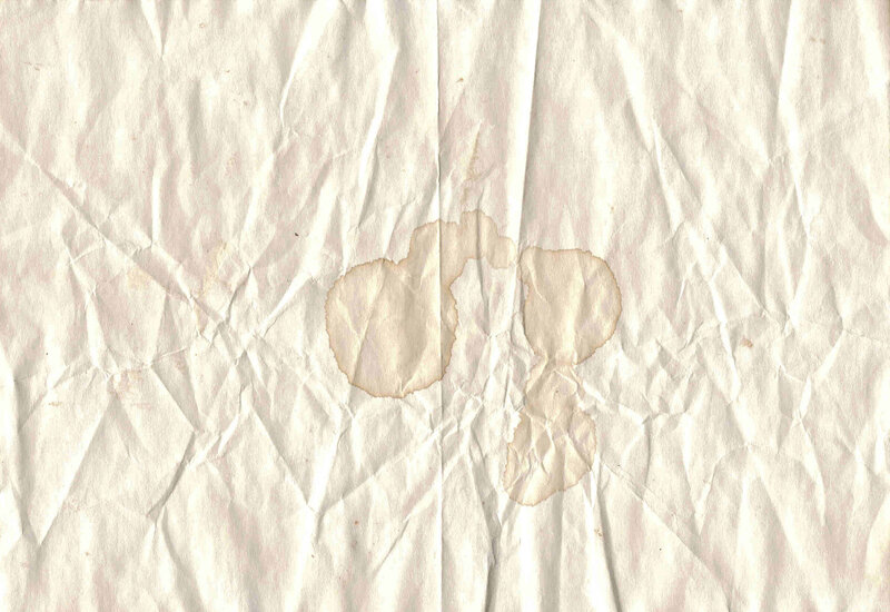 crumpled paper with stain