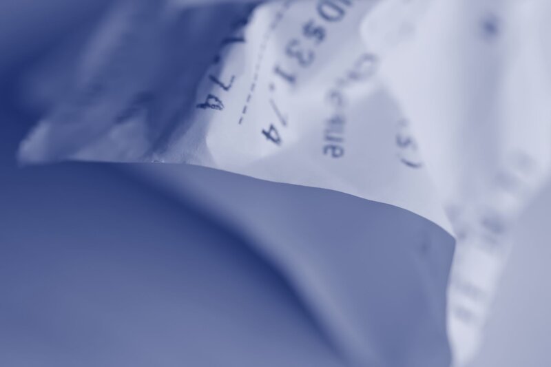 crumpled receipt close-up