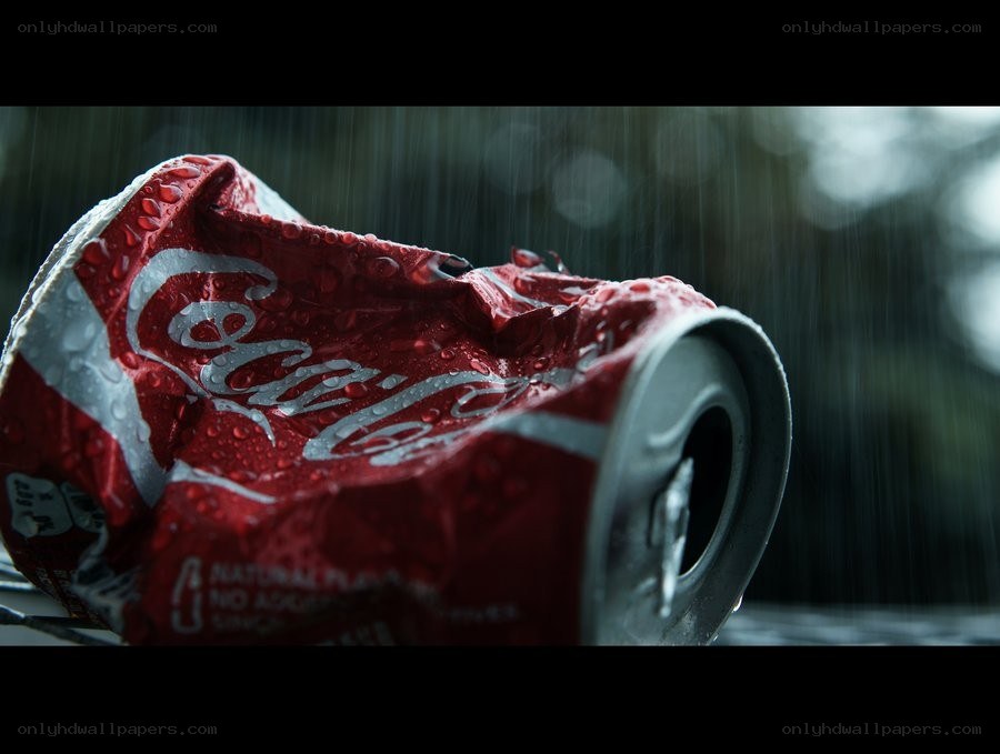 crushed can in the rain