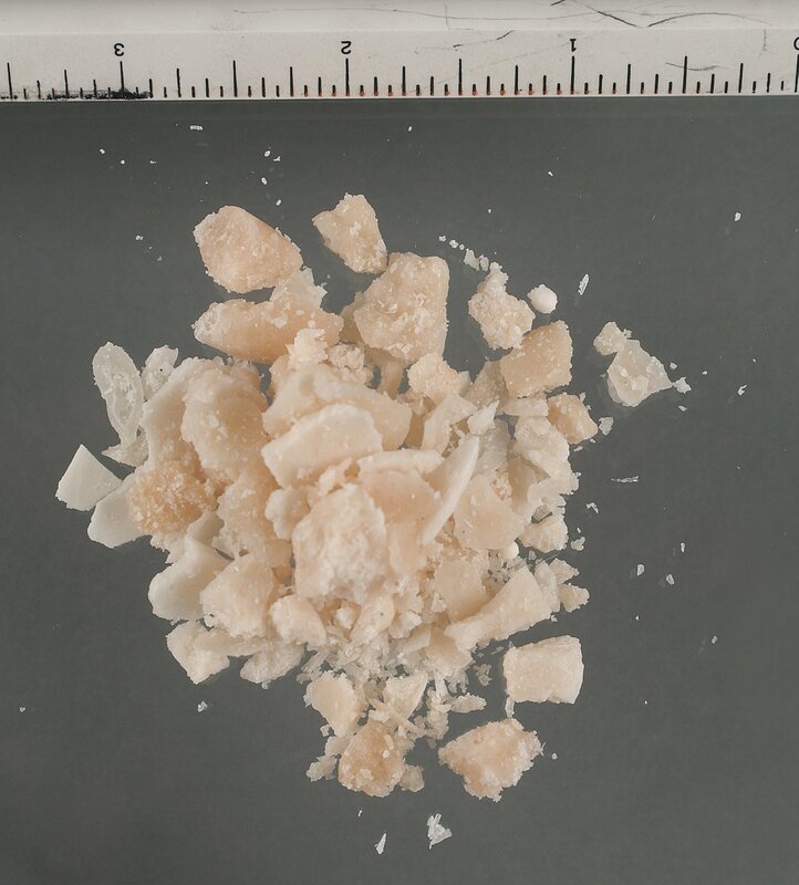 crushed white crystals on surface