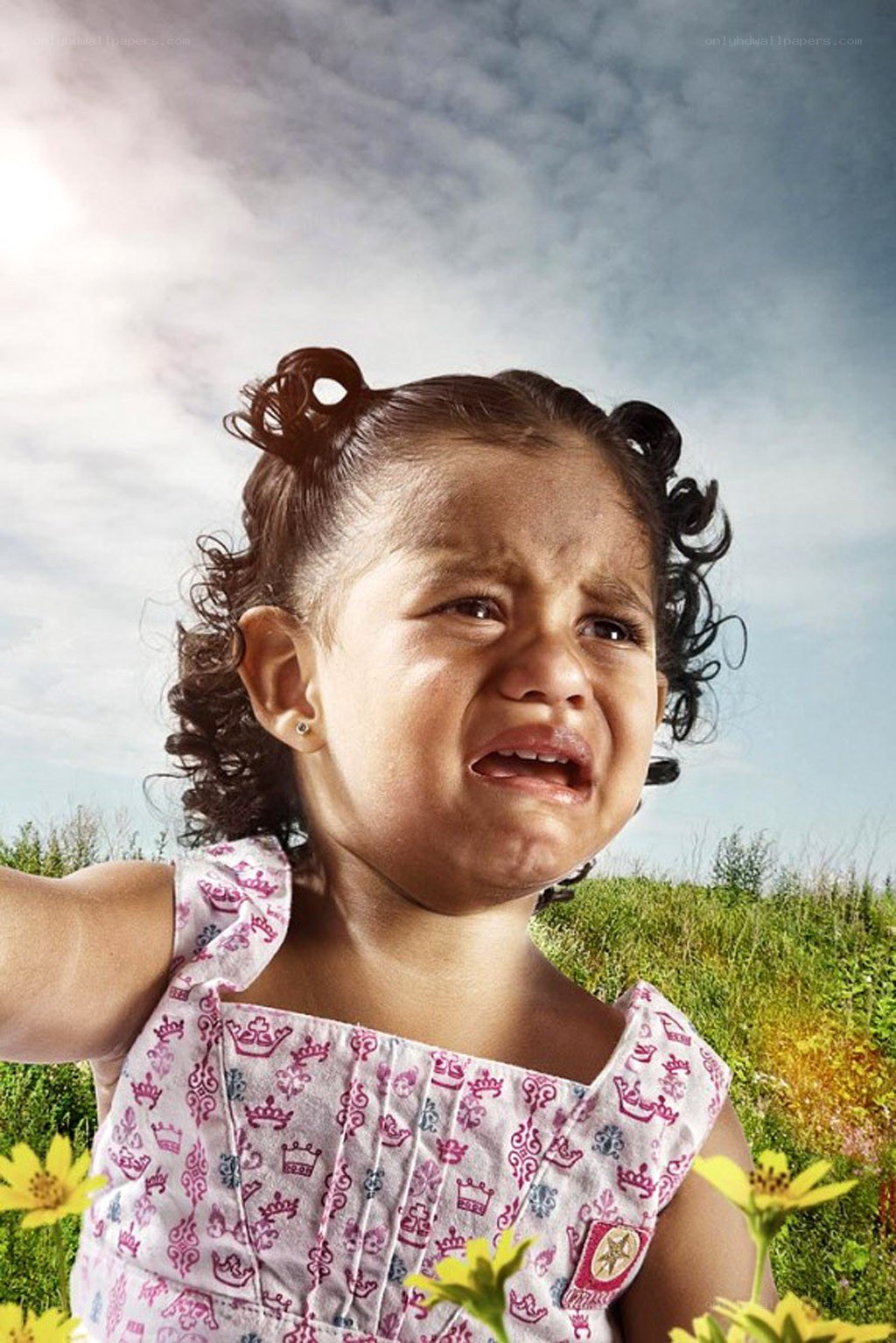 crying girl in a field