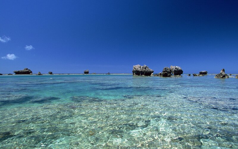 crystal-clear ocean with rocks