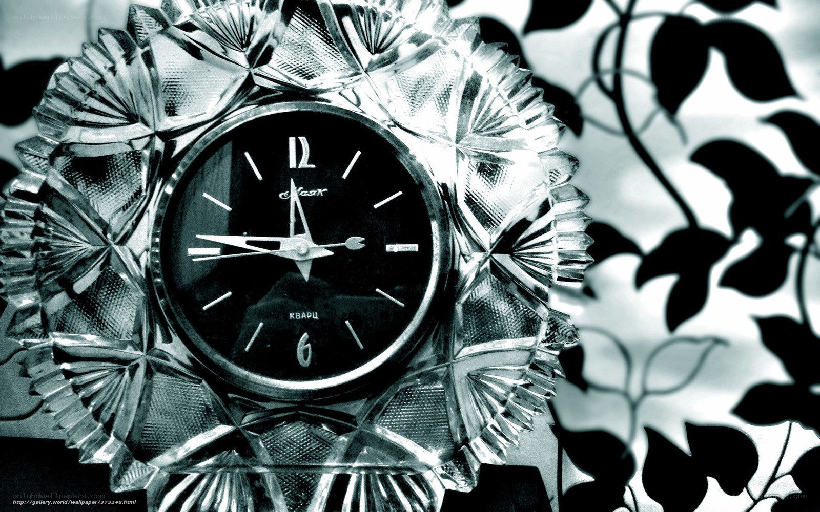 crystal clock with leaf shadow