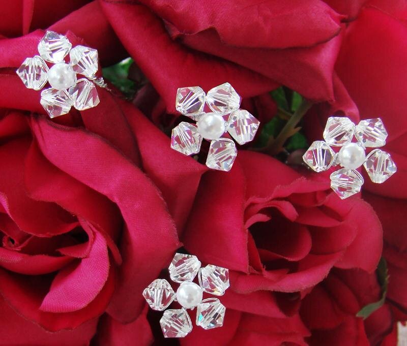 crystal flower pins on red roses