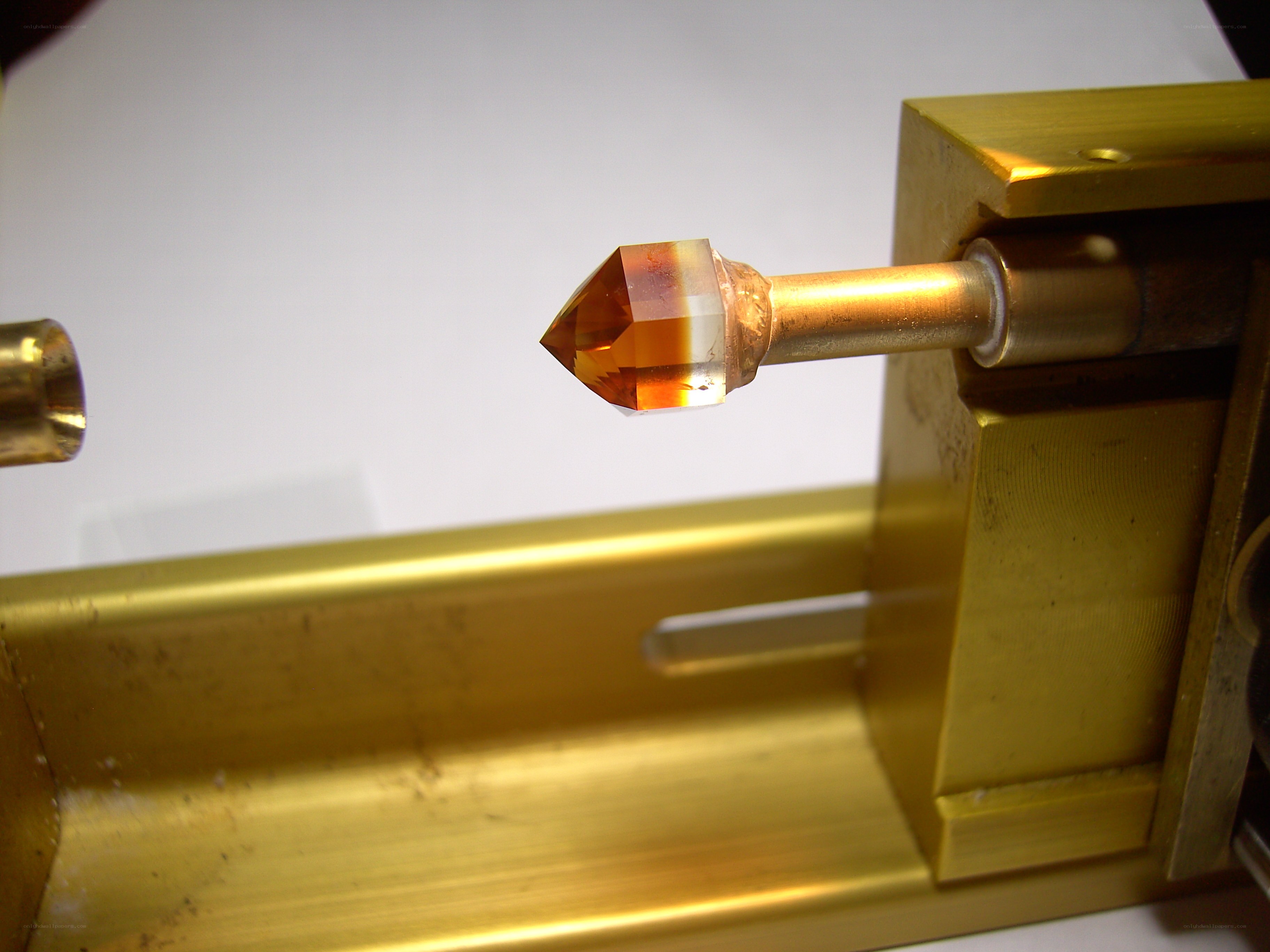 crystal on metal rod