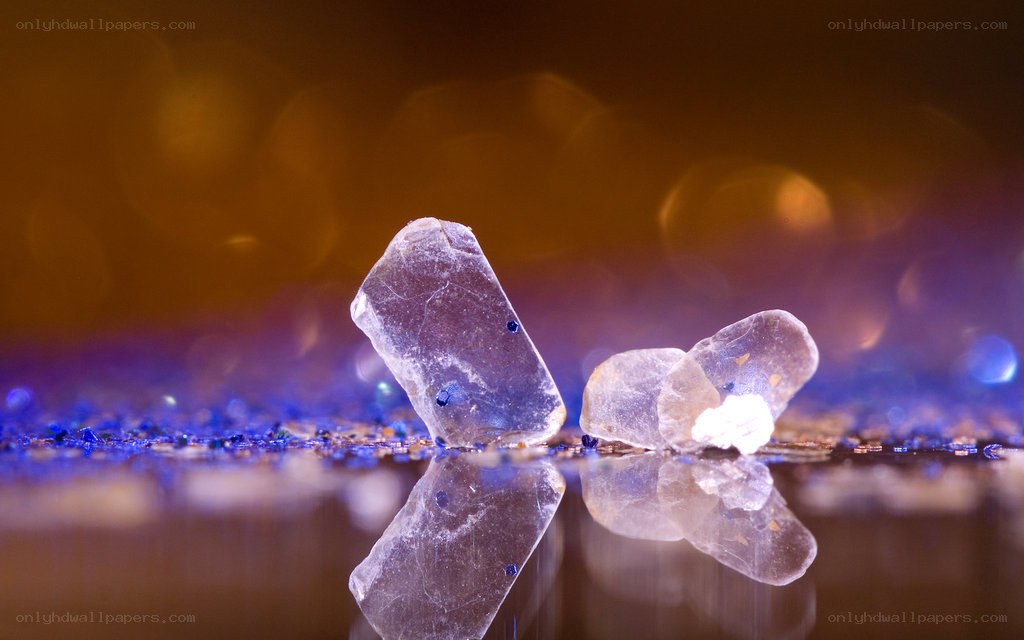 crystal shards on reflective surface