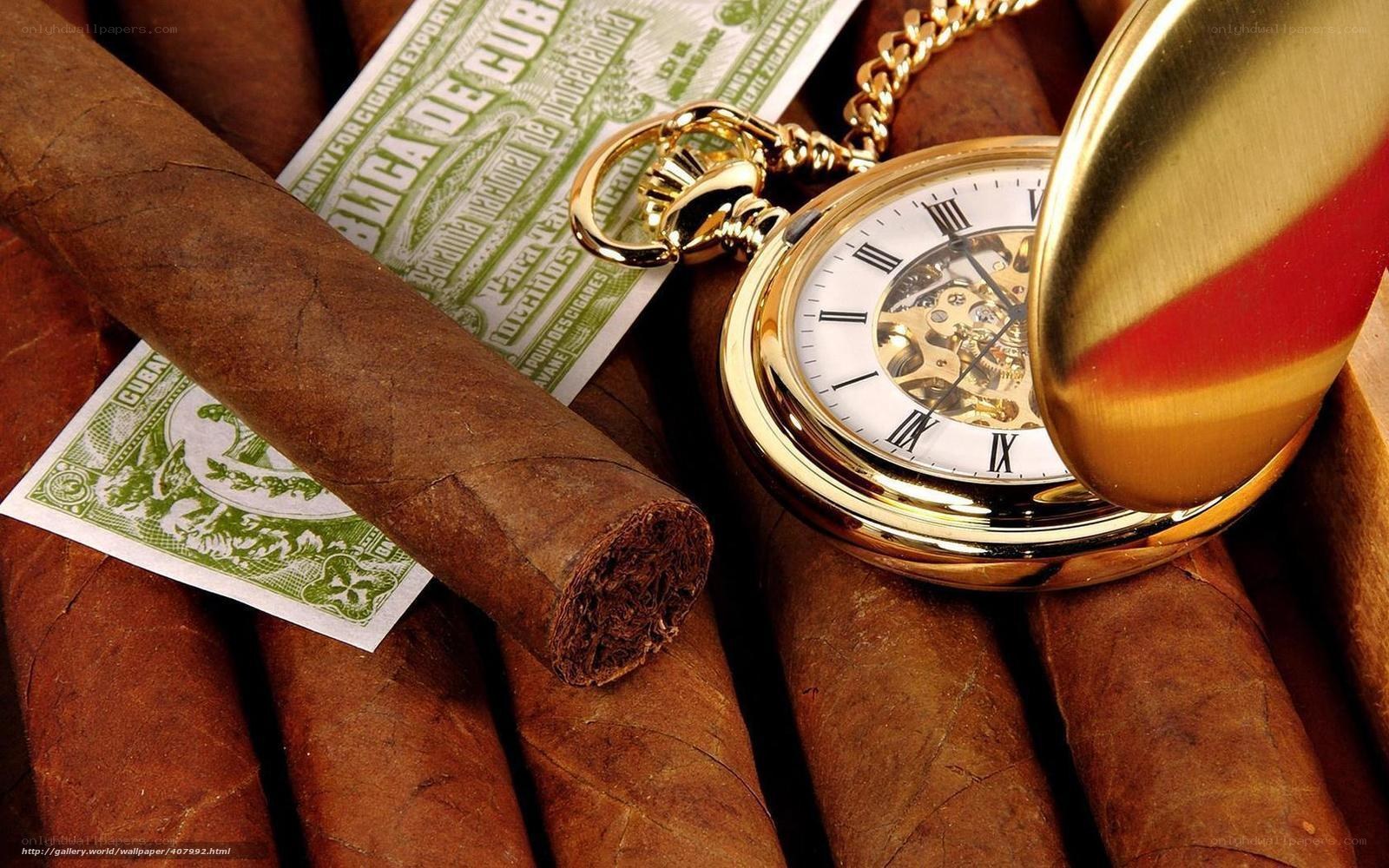 Cuban cigars and pocket watch