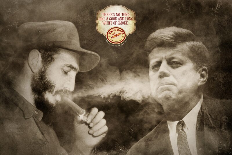 Cuban leader and JFK smoke cigars