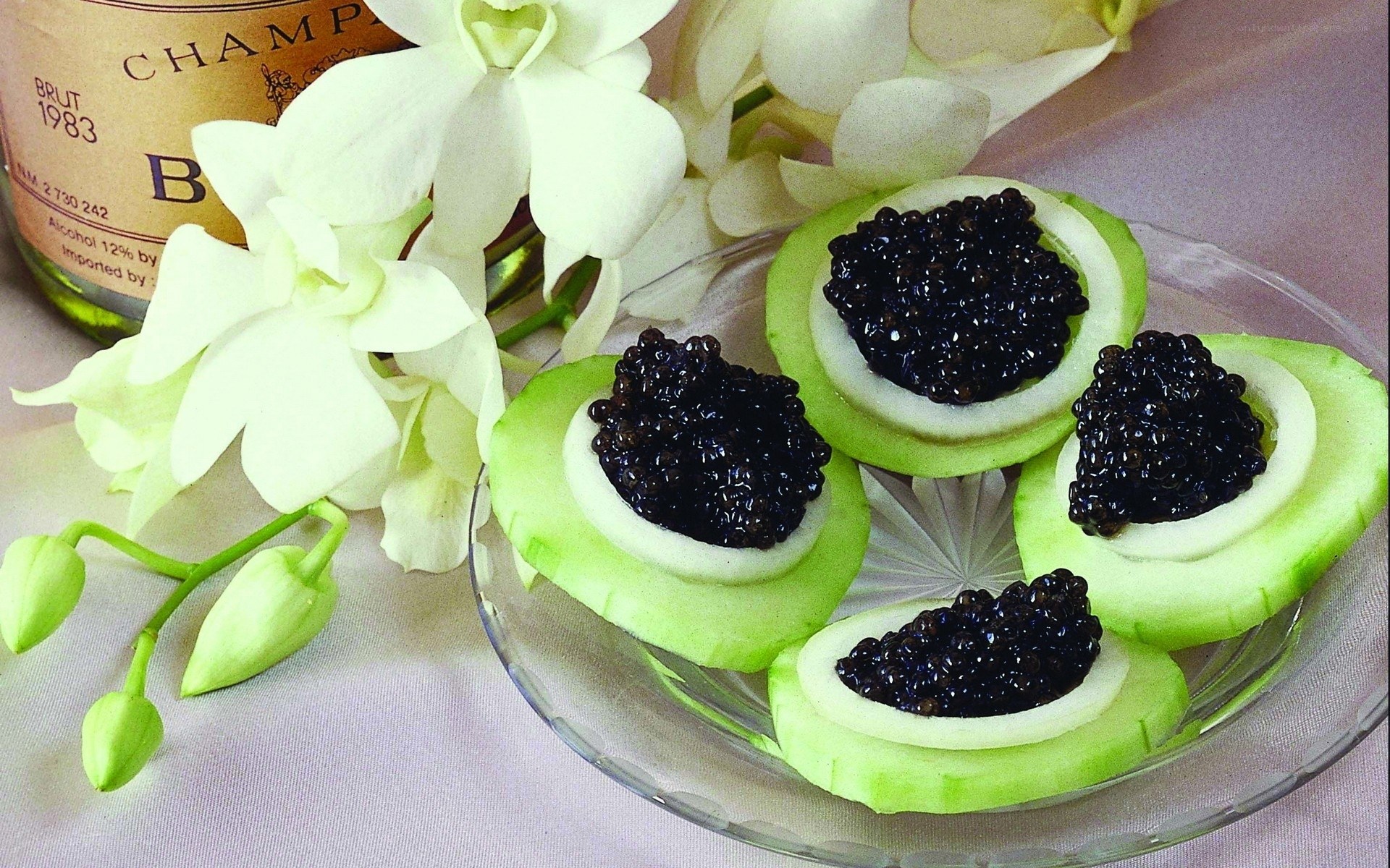 Cucumber with caviar and champagne
