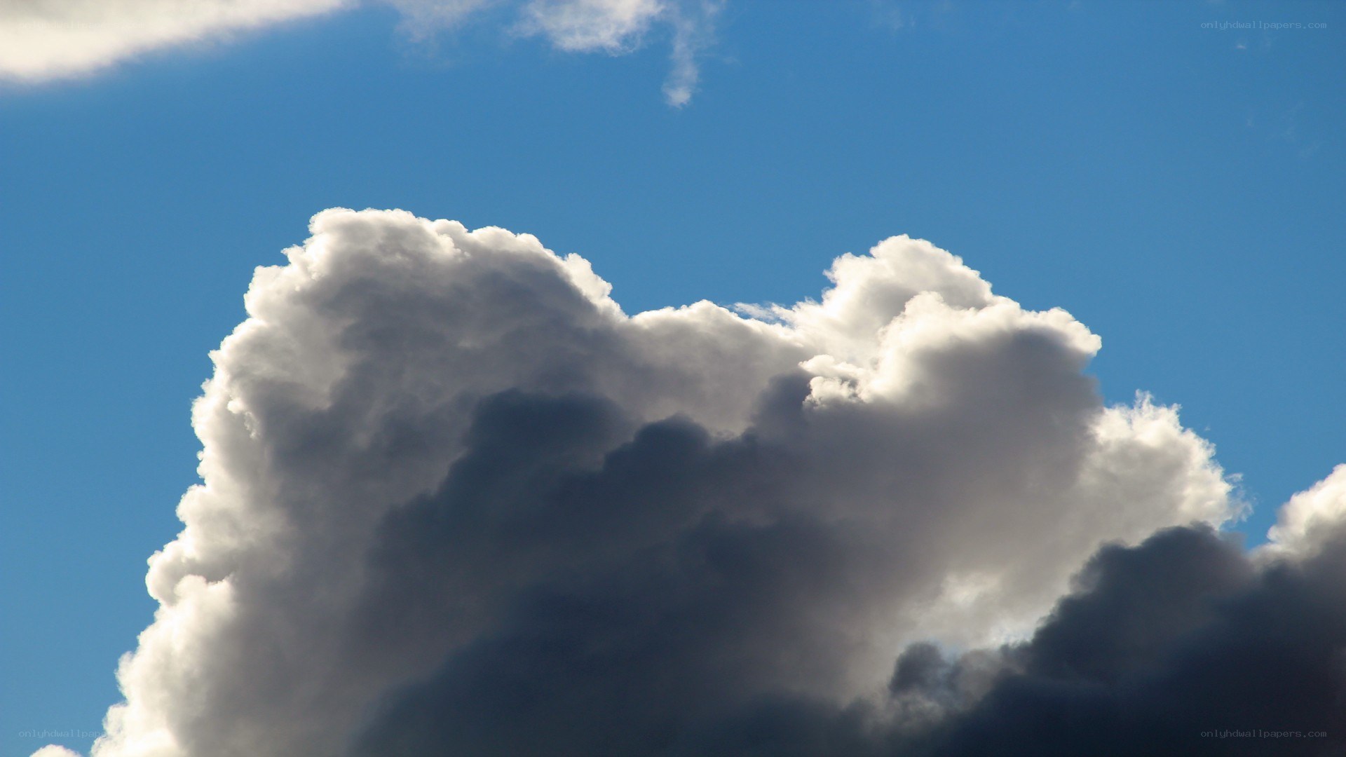 cumulus cloud against blue sky