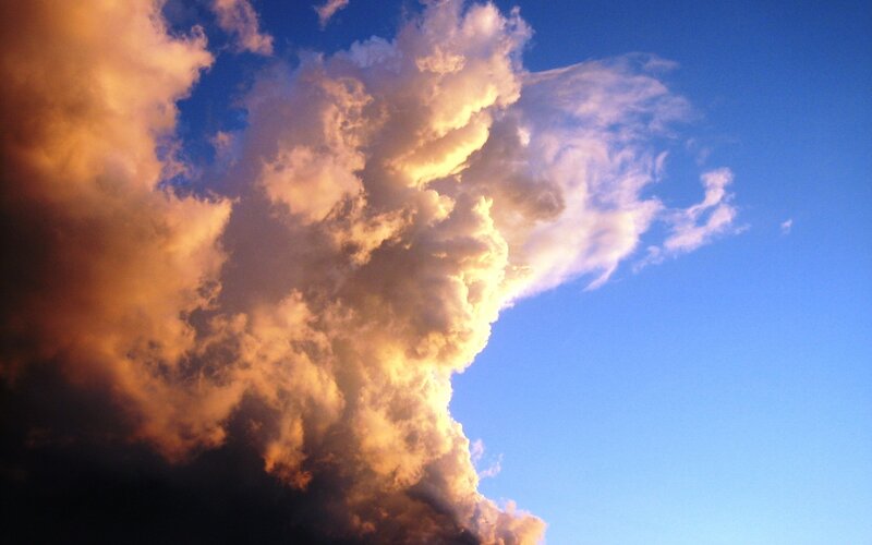 Cumulus Cloud at Sunset — Blue