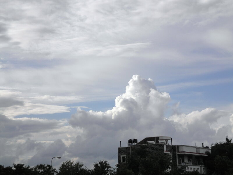 Cumulus Cloud over Building