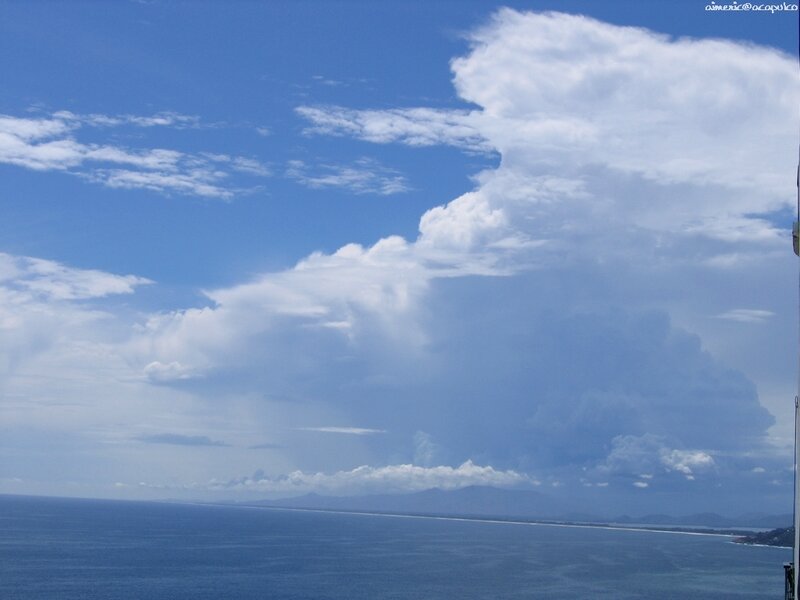 Cumulus Cloud over Ocean — Blue, Dramatic, Afternoon