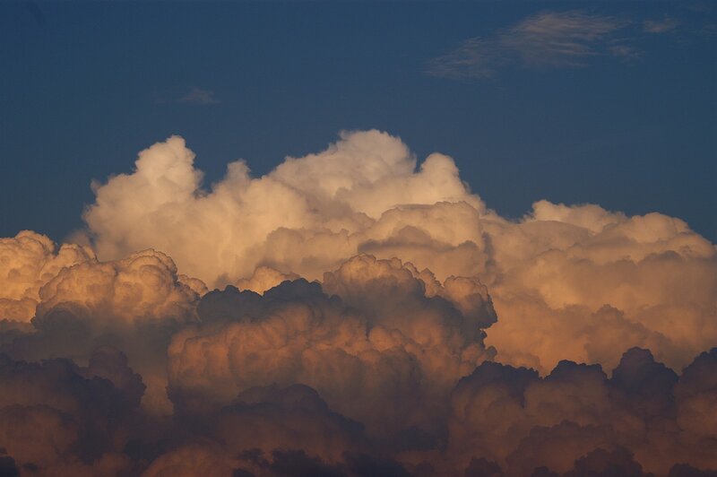 Cumulus Clouds at Dusk — Blue