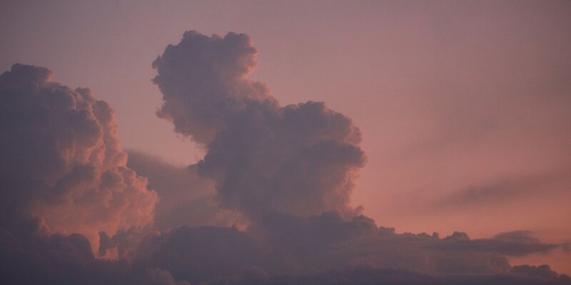 Cumulus Clouds at Dusk — Purple